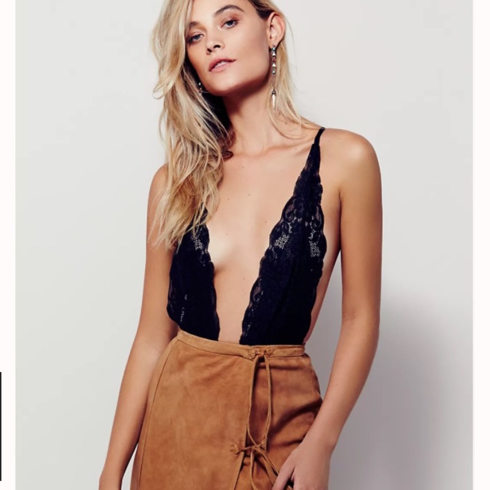 Size small free people coming’ in haht bodysuit